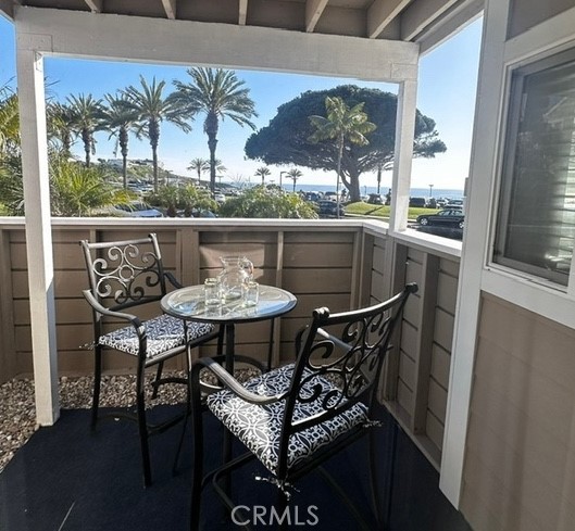 34112 Selva Road, Unit 336 Dana Point, CA 92629 - Photo 4 of 18 a view of a chairs and table in the balcony