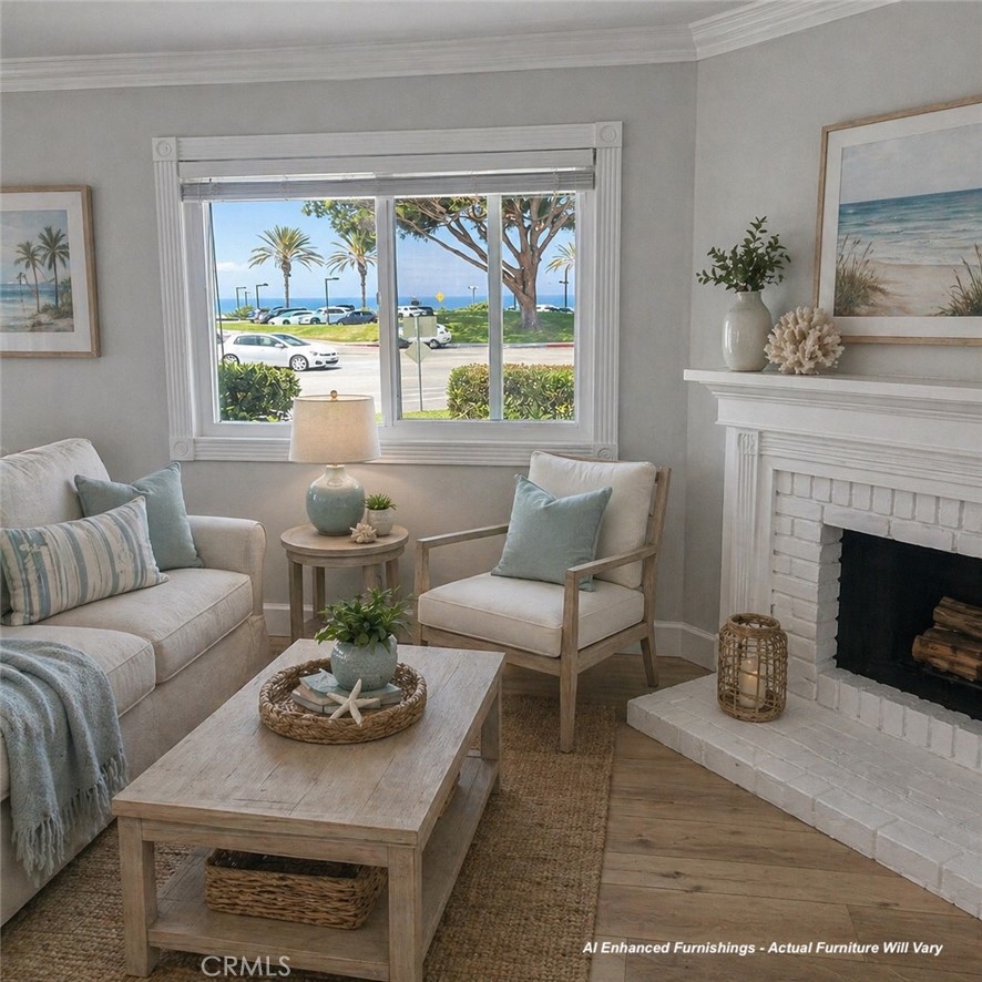 34112 Selva Road, Unit 336 Dana Point, CA 92629 - Photo 6 of 18 a living room with furniture and a fireplace