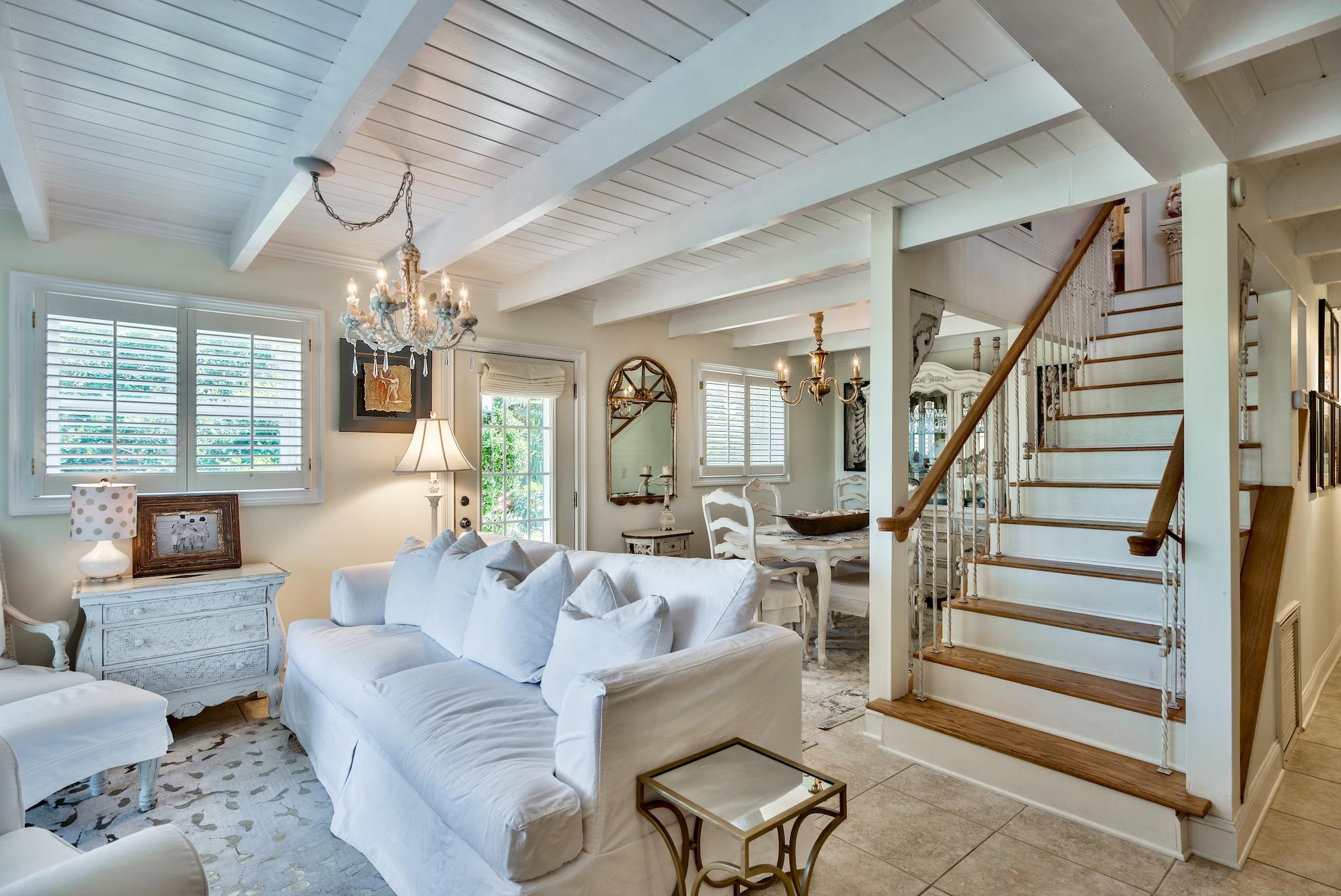 120 South Bishop Road Santa Rosa Beach, FL 32459 - Photo 18 of 64 a living room with furniture and a chandelier