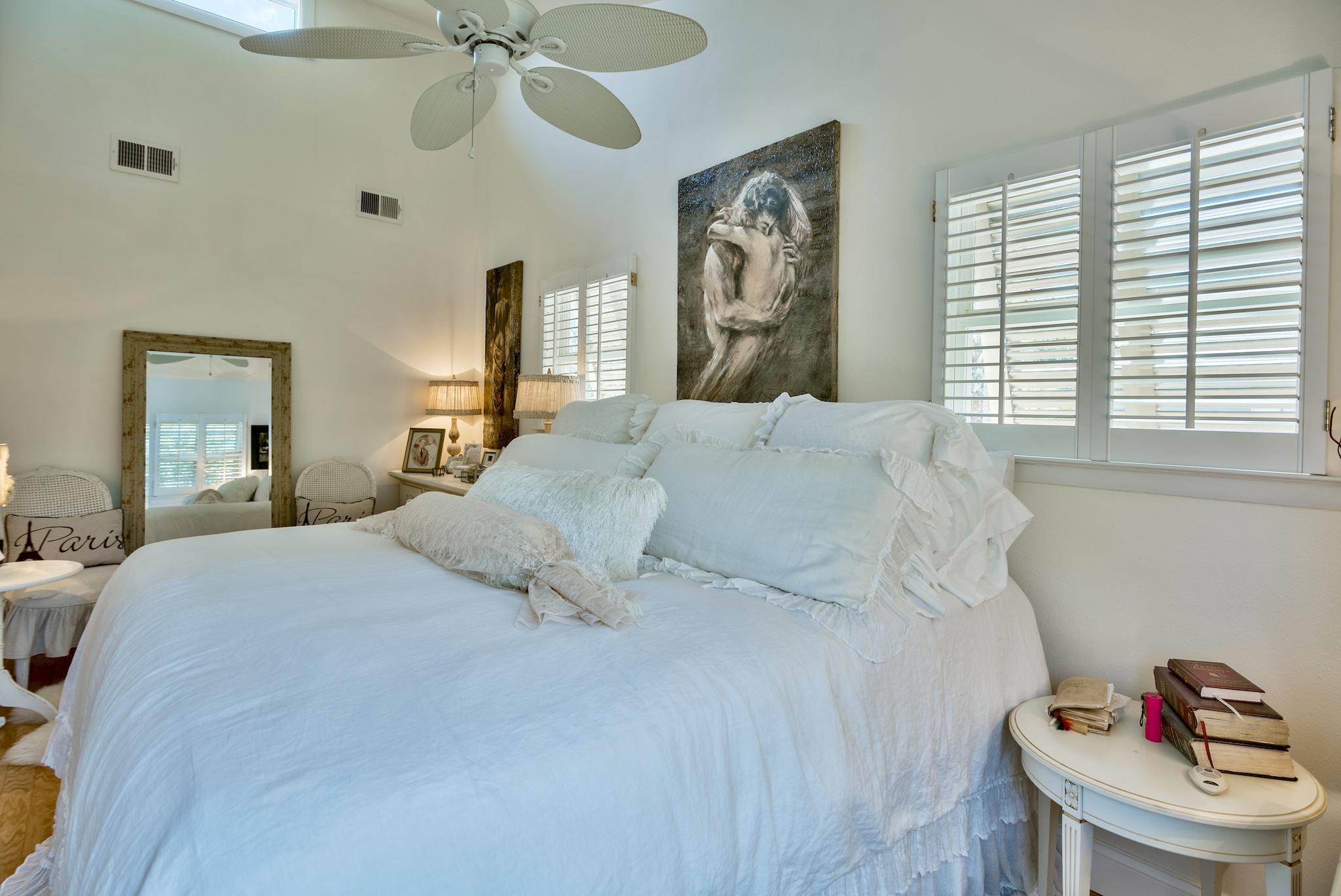 120 South Bishop Road Santa Rosa Beach, FL 32459 - Photo 48 of 64 a bedroom with a bed and a window