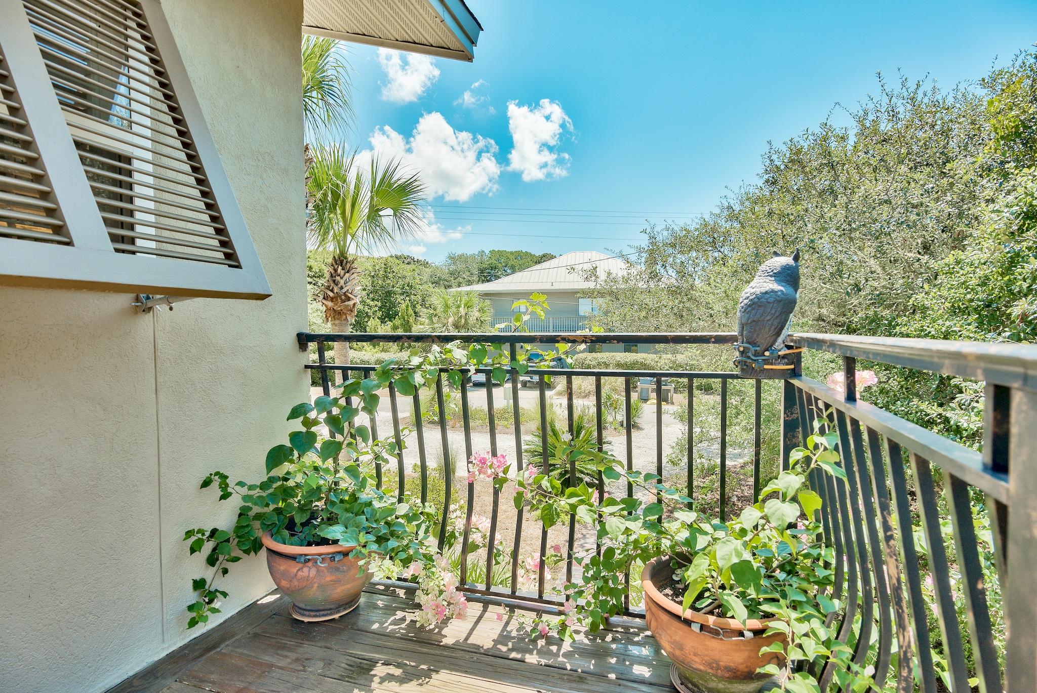 120 South Bishop Road Santa Rosa Beach, FL 32459 - Photo 50 of 64 a view of a balcony with flower plants