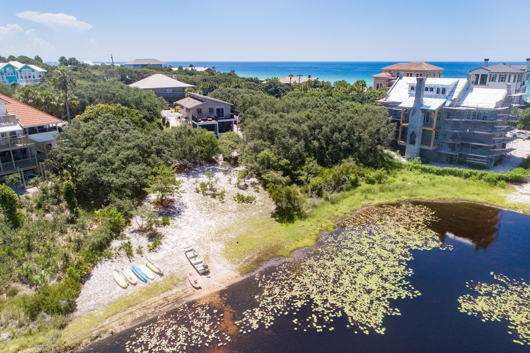 120 South Bishop Road Santa Rosa Beach, FL 32459 - Photo 55 of 64 a view of a garden with a pond