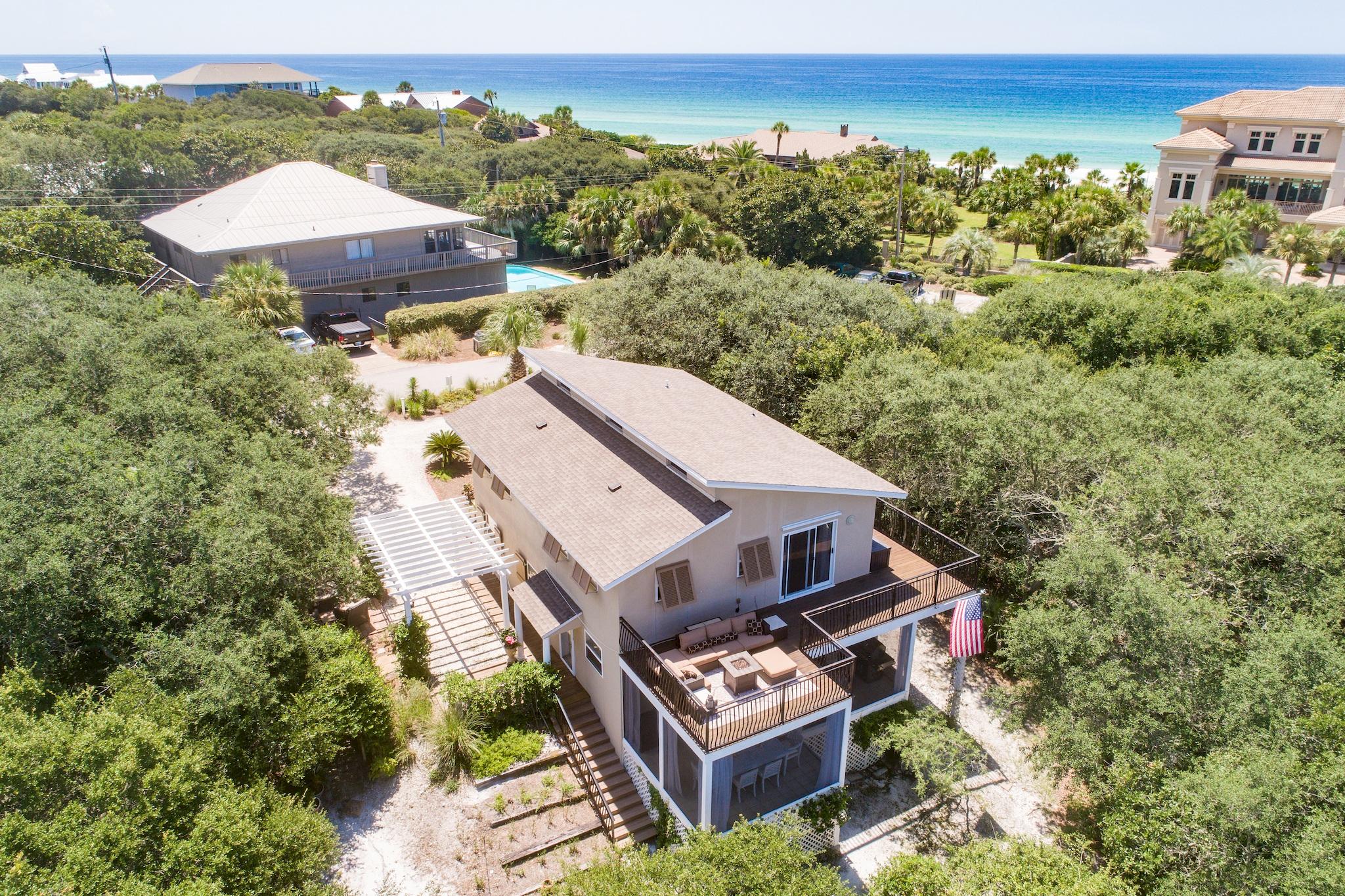 120 South Bishop Road Santa Rosa Beach, FL 32459 - Photo 56 of 64 an aerial view of a house with a yard