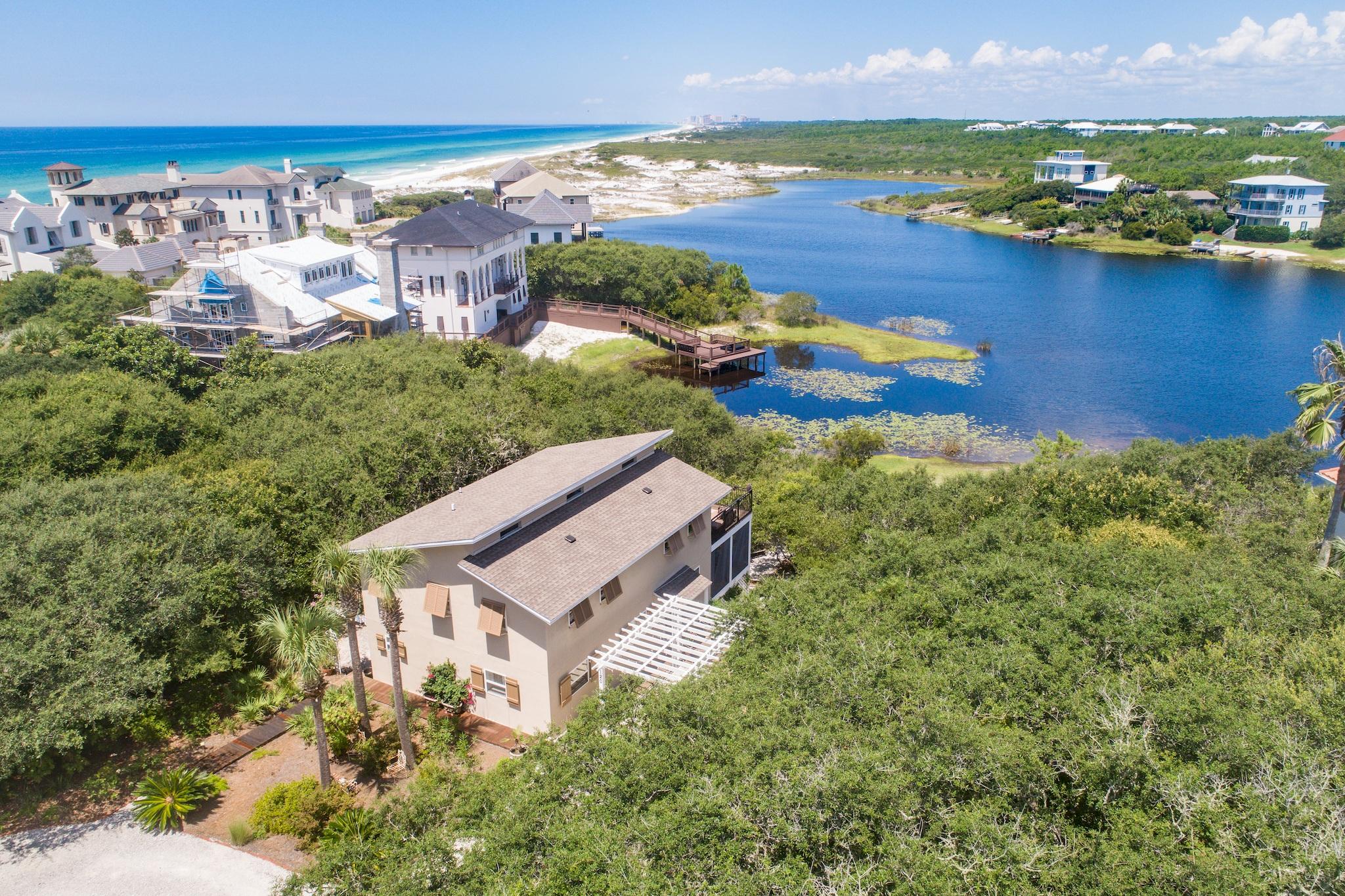 120 South Bishop Road Santa Rosa Beach, FL 32459 - Photo 61 of 64 an aerial view of residential houses with outdoor space and river