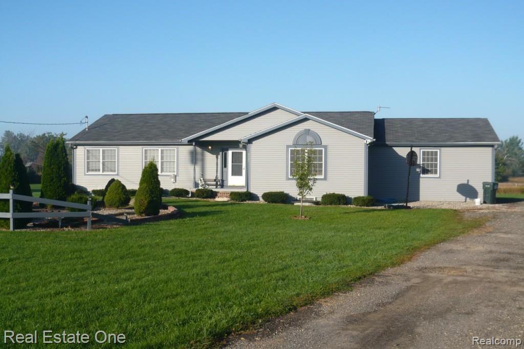 2443 Burke Road Fowlerville, MI 48836 - Photo 1 of 24 Burke Front 9 26.jpg