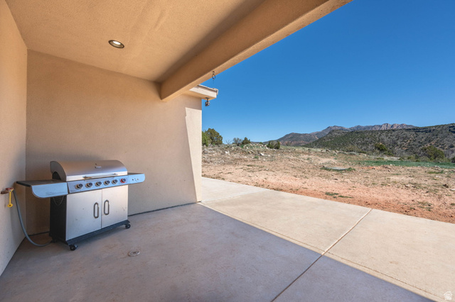 62 North Lucky 7 Road Veyo, UT 84782 - Photo 28 of 43 View of patio with grilling area and a mountain view