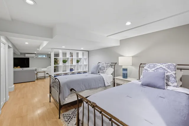 a view of a deck with table and chairs and wooden floor