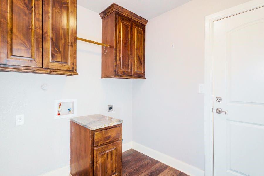4319 County Road 337 Early, TX 76802 - Photo 16 of 31 a utility room with a sink dryer and washer