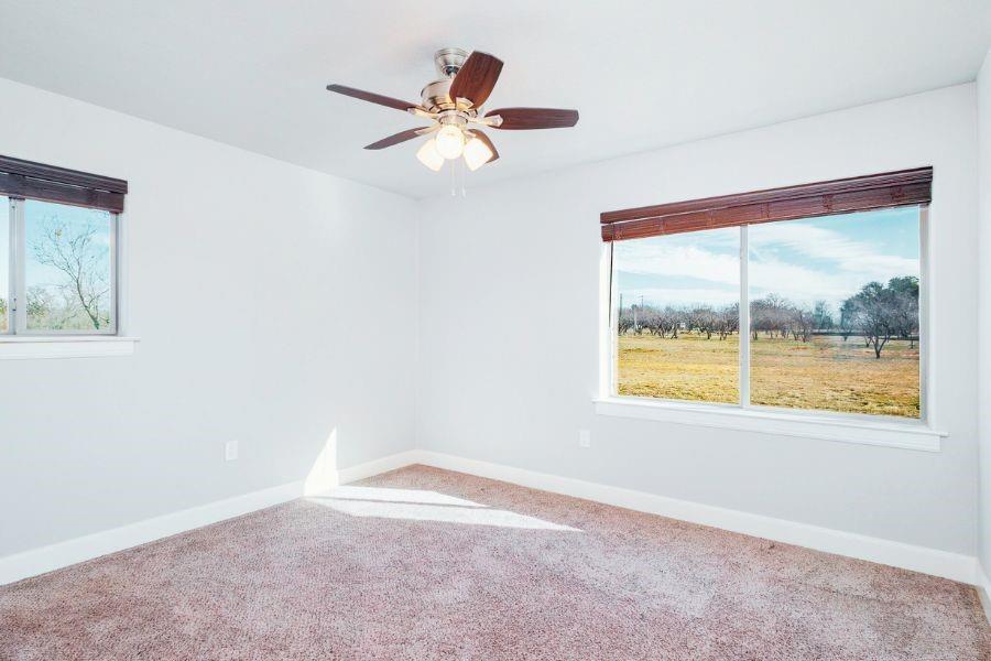 4319 County Road 337 Early, TX 76802 - Photo 18 of 31 an empty room with a window