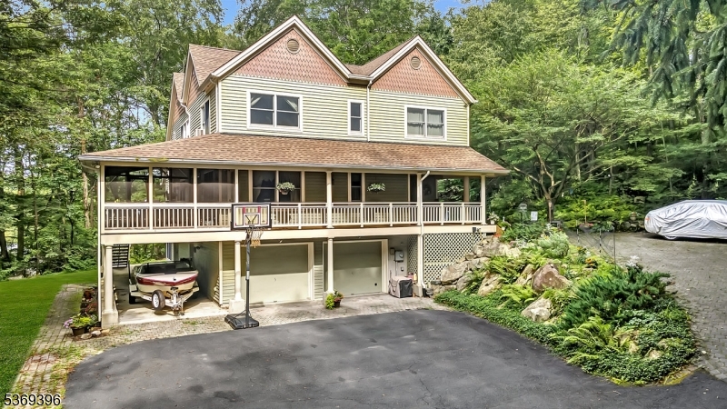 18 Hickory Run Road Califon, NJ 07830 - Photo 1 of 32 a view of small house with yard and sitting area