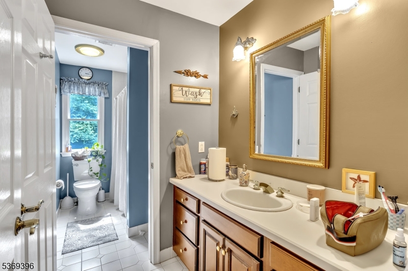 18 Hickory Run Road Califon, NJ 07830 - Photo 20 of 32 a bathroom with a sink and a mirror