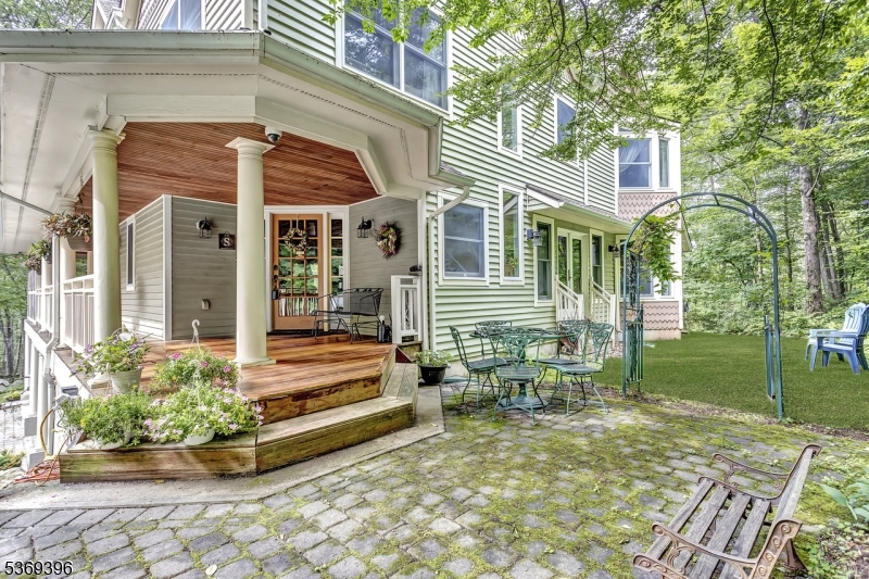 18 Hickory Run Road Califon, NJ 07830 - Photo 2 of 32 a backyard of a house with outdoor seating