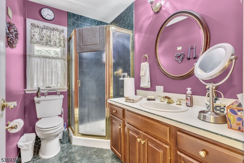 18 Hickory Run Road Califon, NJ 07830 - Photo 21 of 32 a bathroom with a granite countertop toilet sink mirror and vanity