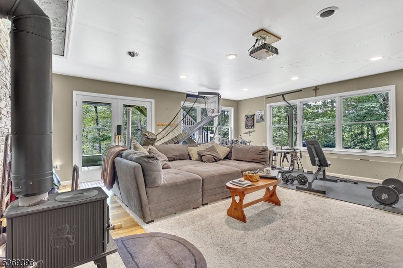 18 Hickory Run Road Califon, NJ 07830 - Photo 23 of 32 a living room with furniture and a large window
