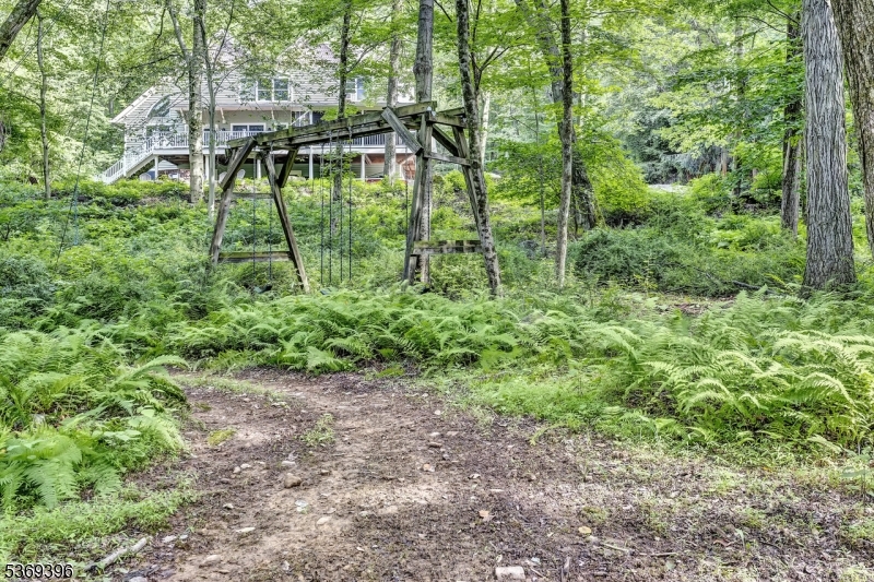 18 Hickory Run Road Califon, NJ 07830 - Photo 30 of 32 a backyard of a house with lots of green space