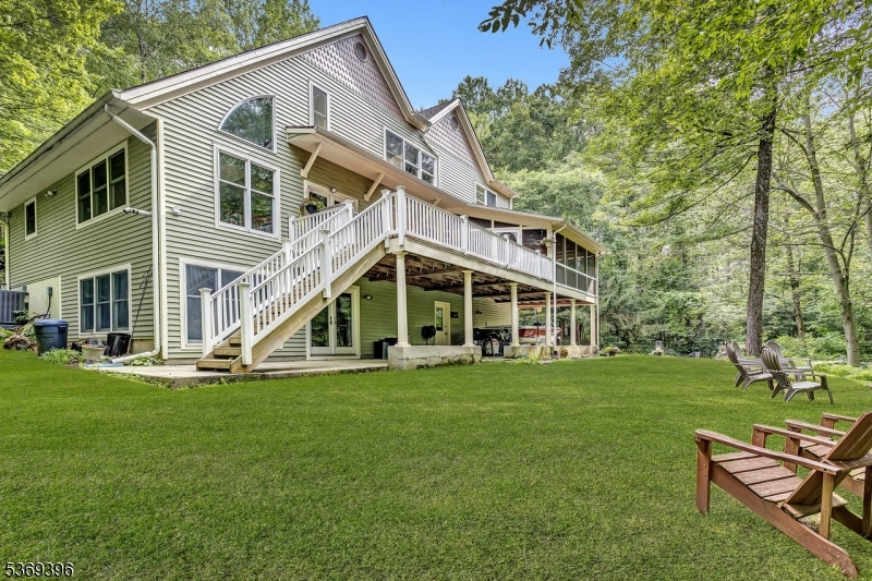 18 Hickory Run Road Califon, NJ 07830 - Photo 3 of 32 a view of a house with a yard and sitting area