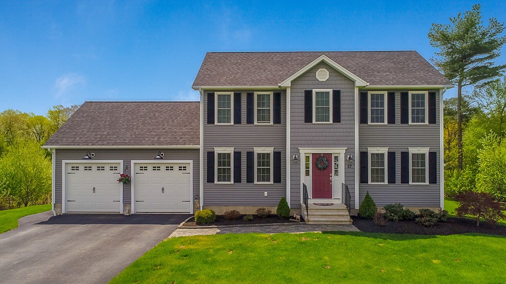 27 Michael Drive Rutland, MA 01543 - Photo 30 of 30 a front view of a house with a yard