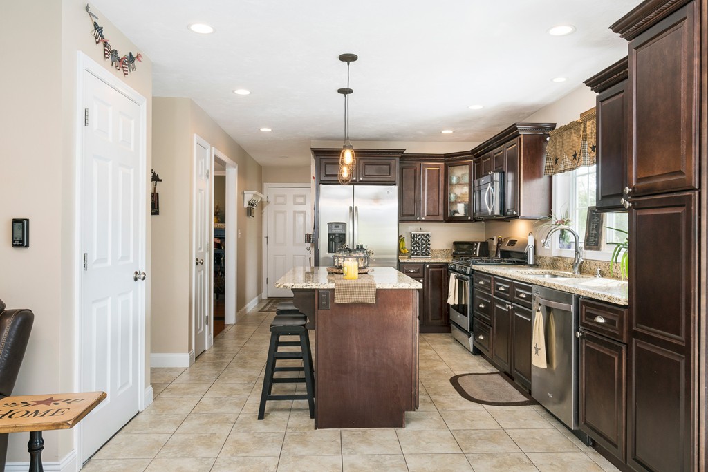 27 Michael Drive Rutland, MA 01543 - Photo 8 of 30 a large kitchen with kitchen island granite countertop lots of counter top space