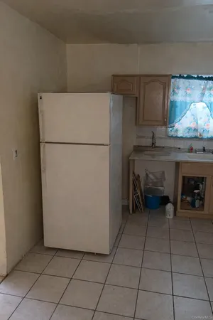 a utility room with washer and dryer