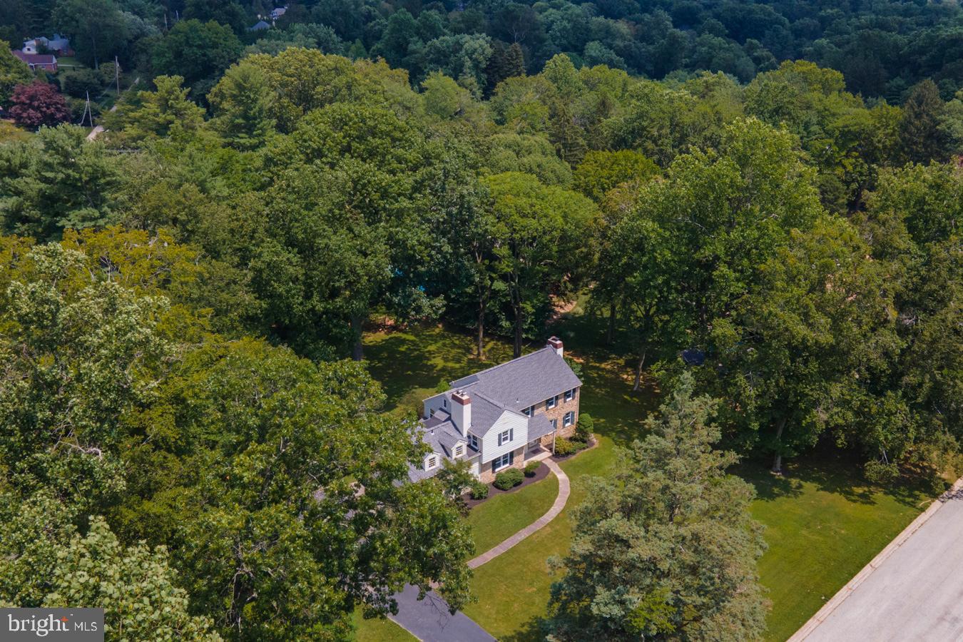 735 Woodcrest Road Wayne, PA 19087 - Photo 3 of 50 an aerial view of a house with a yard