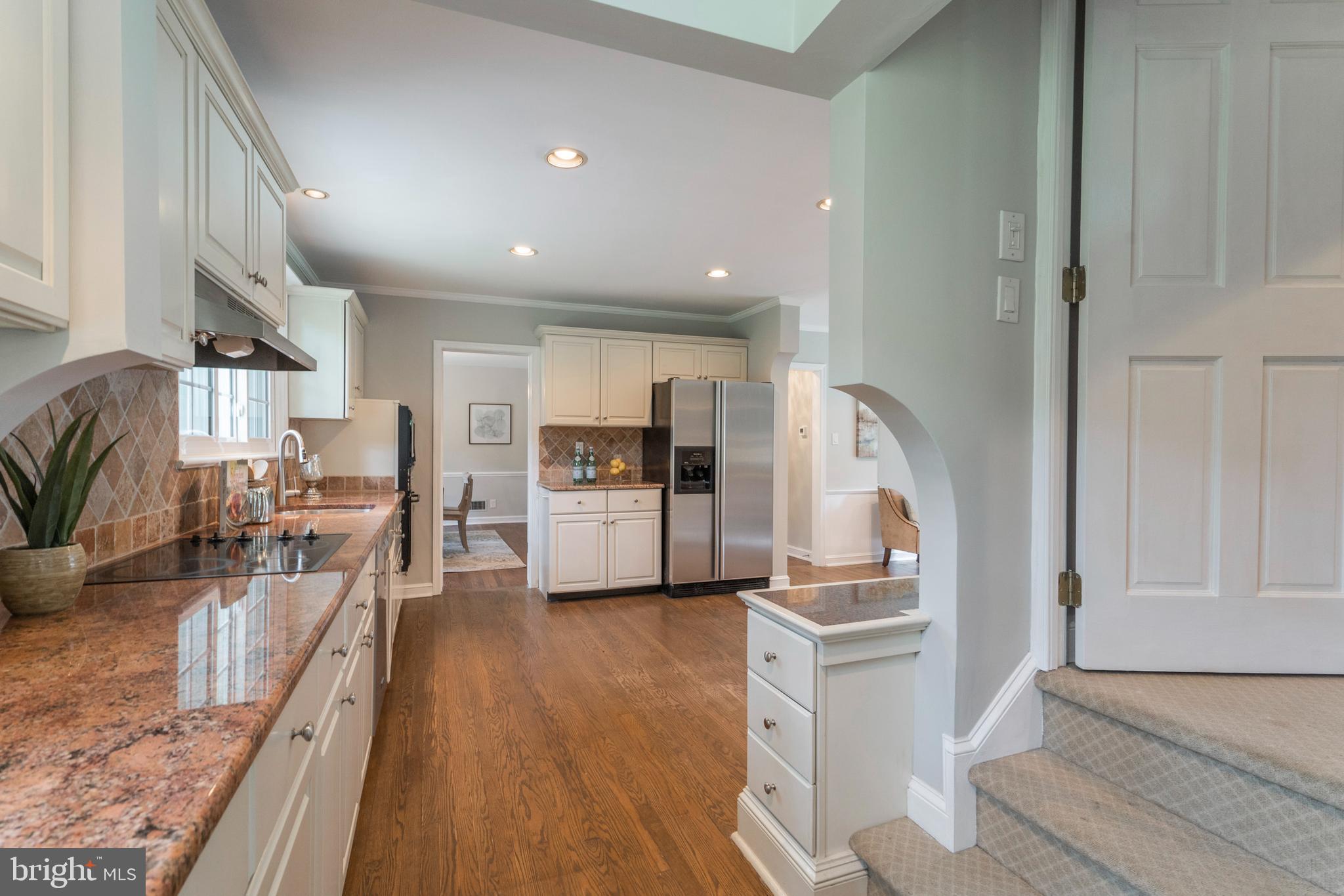 735 Woodcrest Road Wayne, PA 19087 - Photo 22 of 50 a view of kitchen with furniture and wooden floor