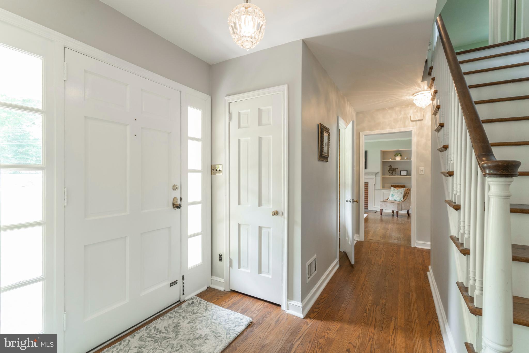 735 Woodcrest Road Wayne, PA 19087 - Photo 4 of 50 a view of a hallway with wooden floor and staircase