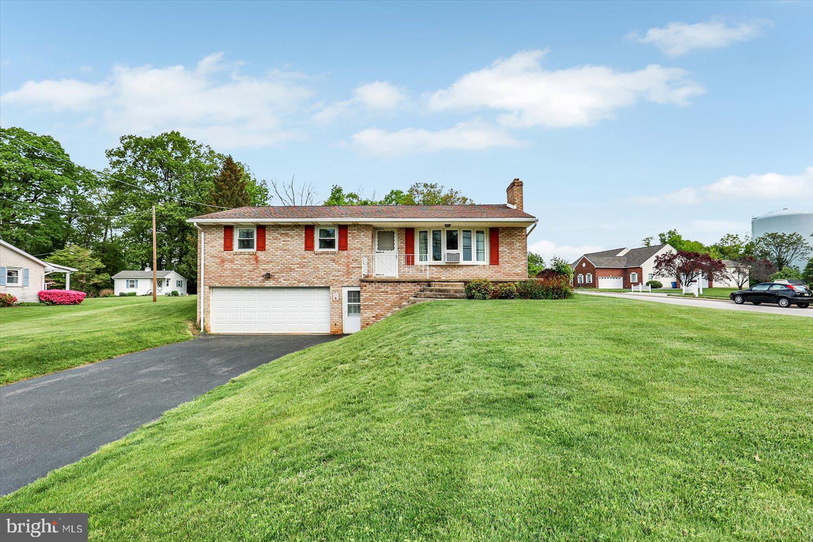 4447 Walters Hatchery Road Spring Grove, PA 17362 - Photo 3 of 36 front view of house with a yard