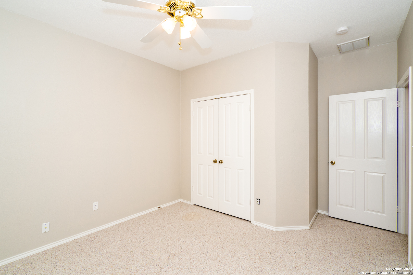 244 Turkey Tree Cibolo, TX 78108 - Photo 32 of 48 an empty room with a chandelier fan