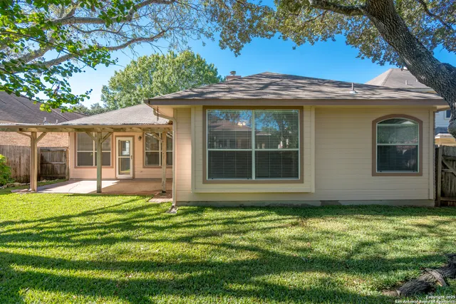 a view of a house with a garden