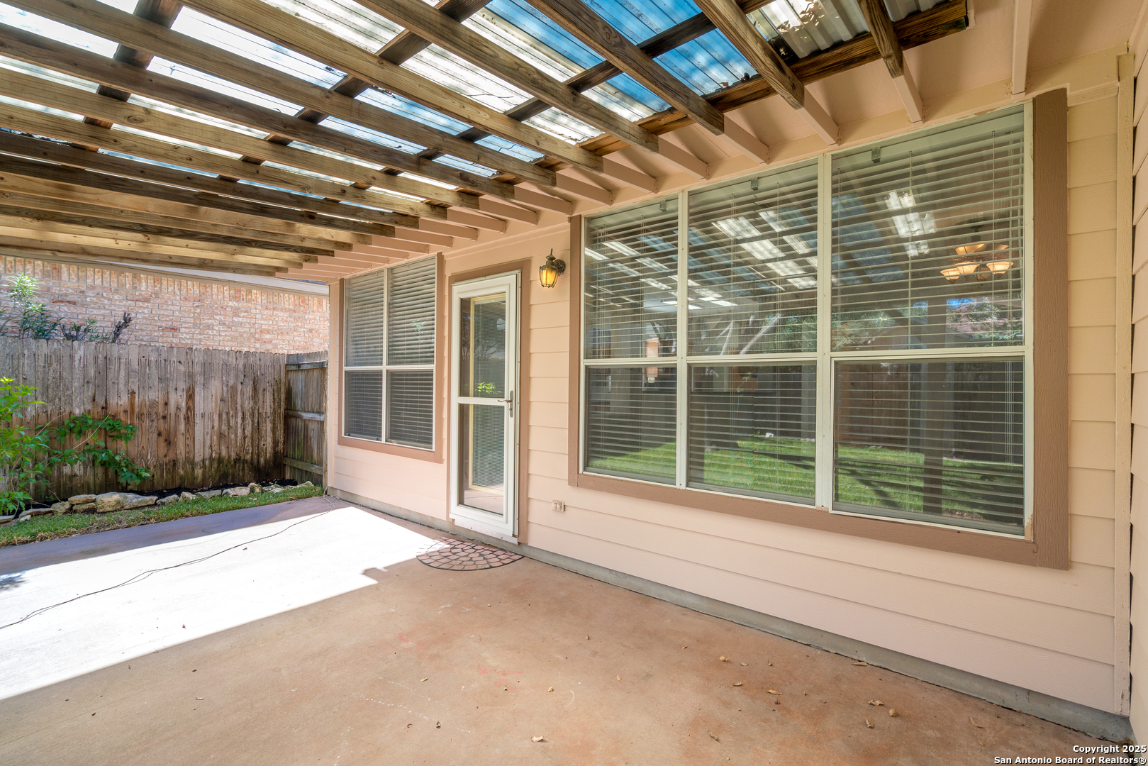 244 Turkey Tree Cibolo, TX 78108 - Photo 45 of 48 a view of backyard with large windows