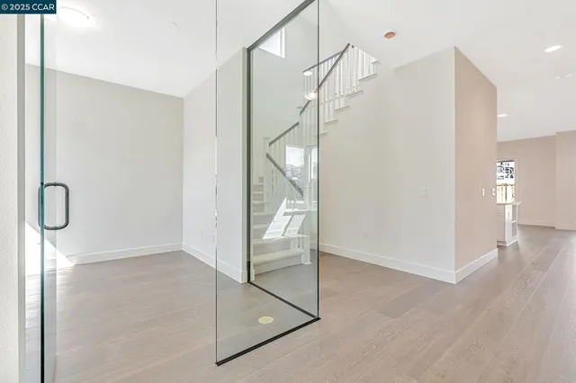 a view of entryway with wooden floor