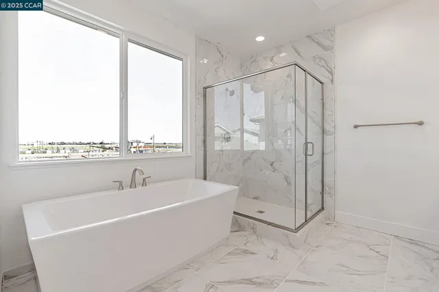 a bathroom with a sink double vanity and a mirror