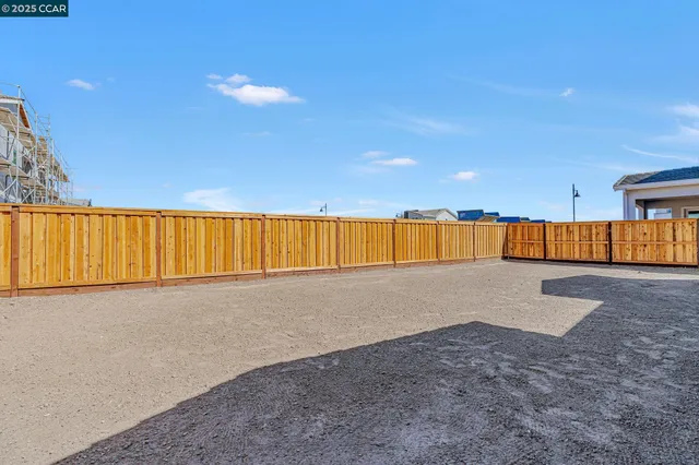 a view of a swimming pool with an outdoor seating