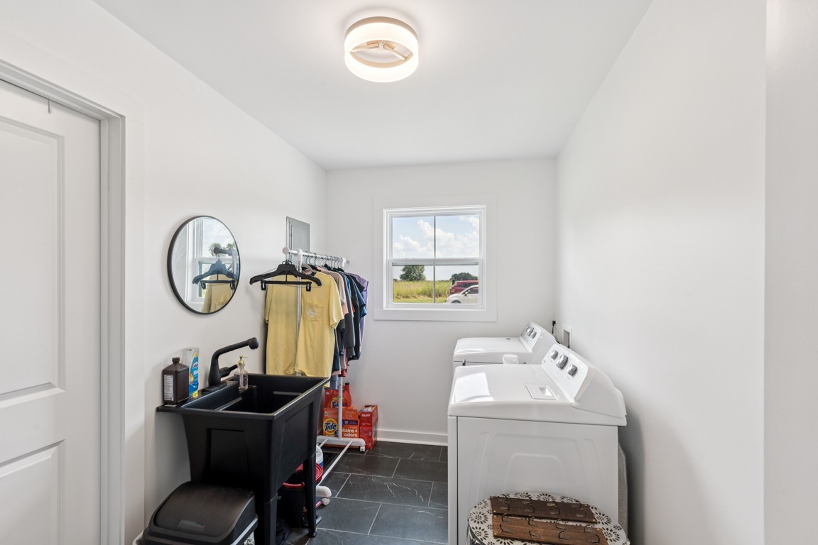 2590 Oakdale Road Westmoreland, TN 37186 - Photo 23 of 25 a view of storage and utility room with utility and racks