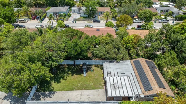 a view of yard and patio