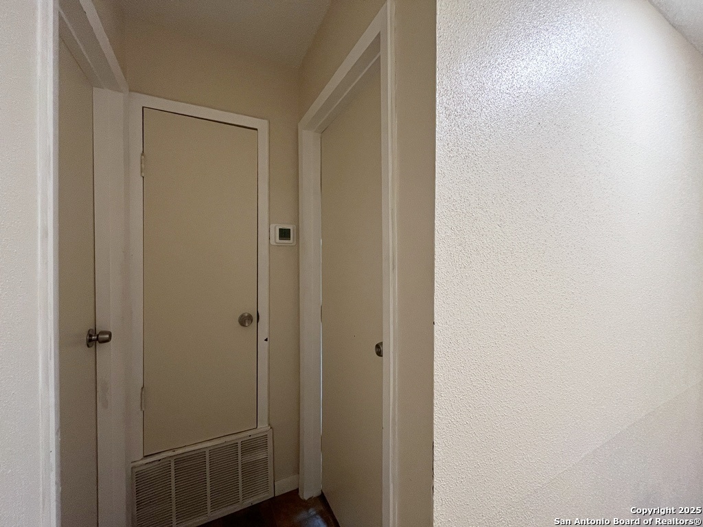 3243 Nacogdoches Road, Unit 404 San Antonio, TX 78217 - Photo 17 of 30 a bathroom with a glass shower door