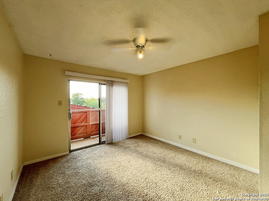 3243 Nacogdoches Road, Unit 404 San Antonio, TX 78217 - Photo 18 of 30 an empty room with a empty space and windows