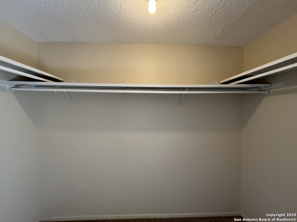 3243 Nacogdoches Road, Unit 404 San Antonio, TX 78217 - Photo 20 of 30 a close view of closet