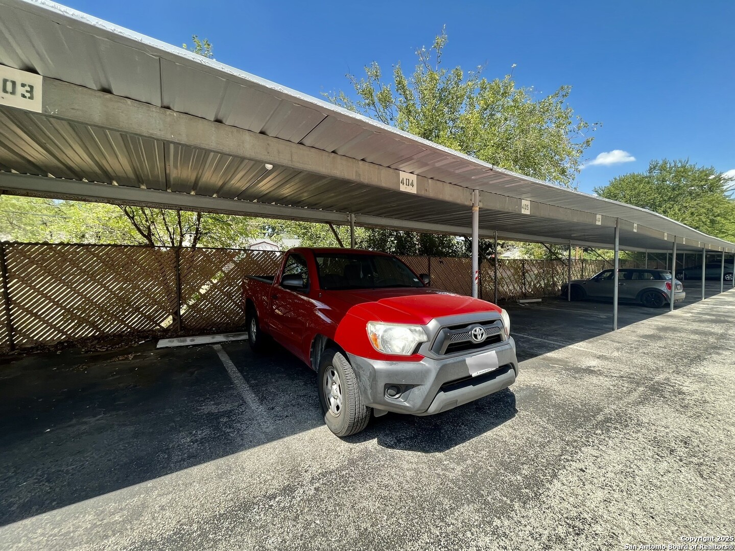 3243 Nacogdoches Road, Unit 404 San Antonio, TX 78217 - Photo 26 of 30 a car parked in front of a building