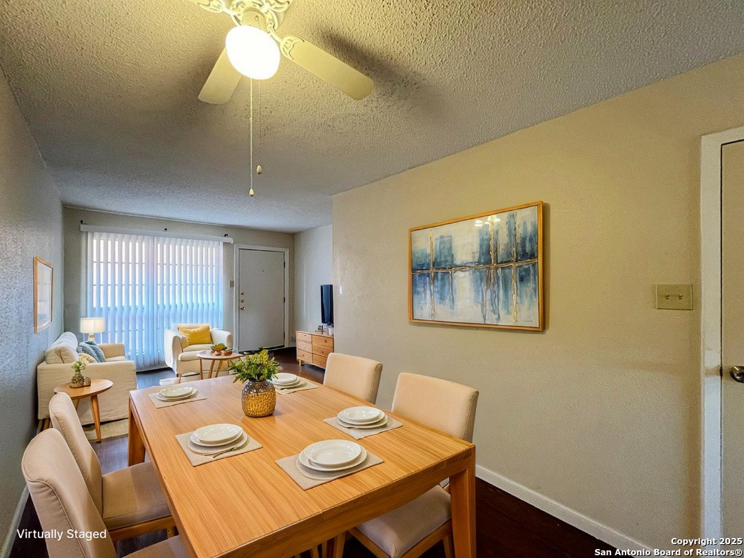 3243 Nacogdoches Road, Unit 404 San Antonio, TX 78217 - Photo 3 of 30 a view of a dining room with furniture window and outside view