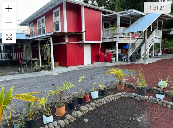 a view of a chairs and table in a patio
