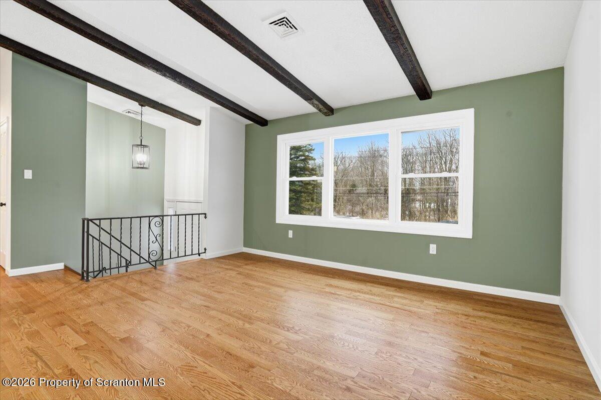 847 Griffin Pond Road Clarks Summit, PA 18411 - Photo 12 of 57 a view of an empty room with a window