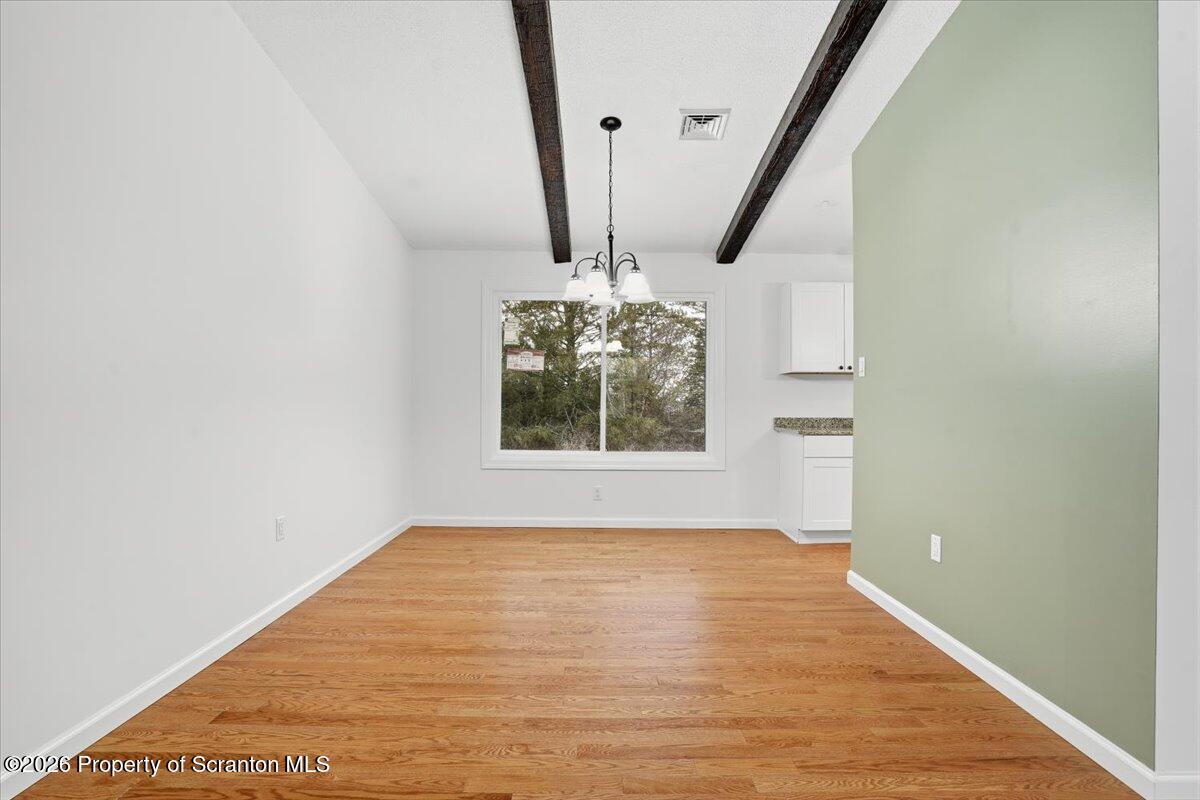 847 Griffin Pond Road Clarks Summit, PA 18411 - Photo 14 of 57 a view of empty room with window