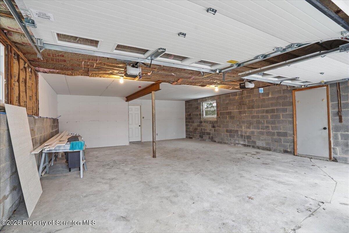 847 Griffin Pond Road Clarks Summit, PA 18411 - Photo 44 of 57 a view of empty room with wooden walls