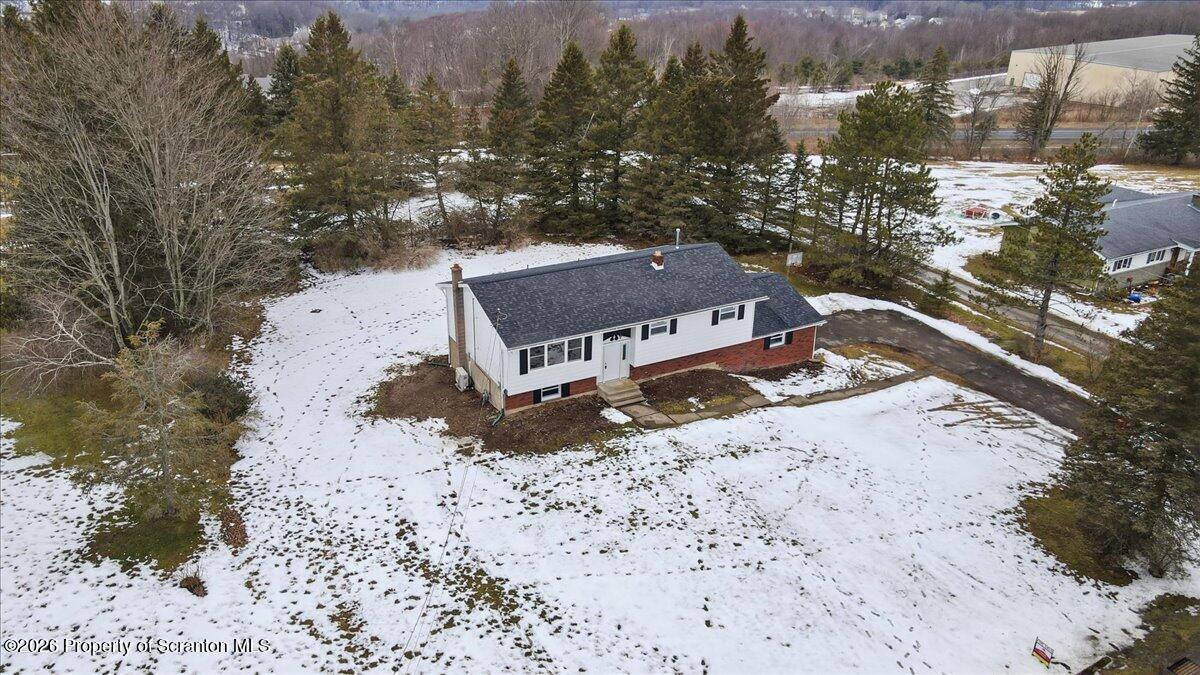 847 Griffin Pond Road Clarks Summit, PA 18411 - Photo 10 of 57 a view of a lake with a mountain