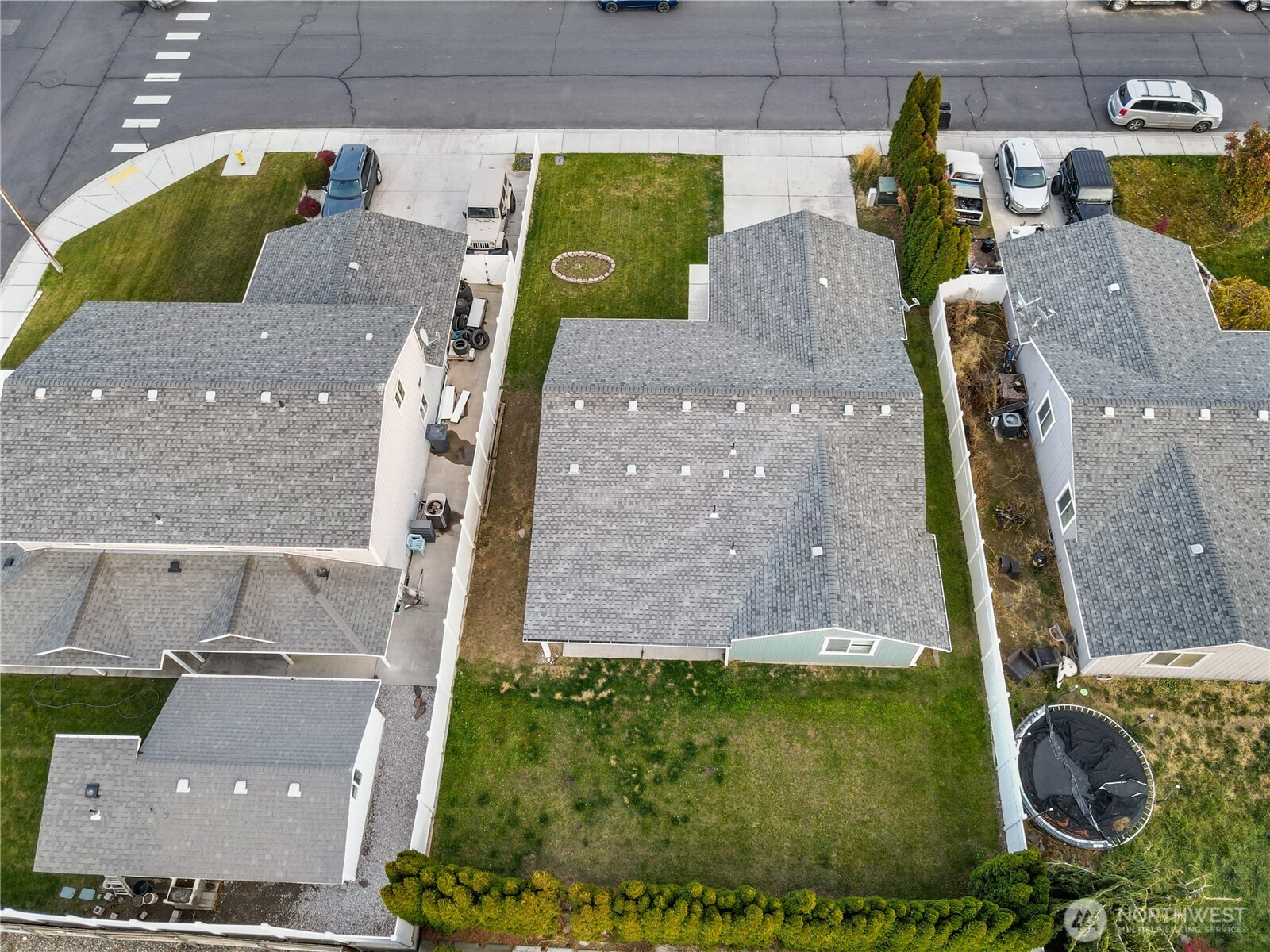 940 Capstone Avenue Othello, WA 99344 - Photo 23 of 25 an aerial view of a house with a yard and a fountain