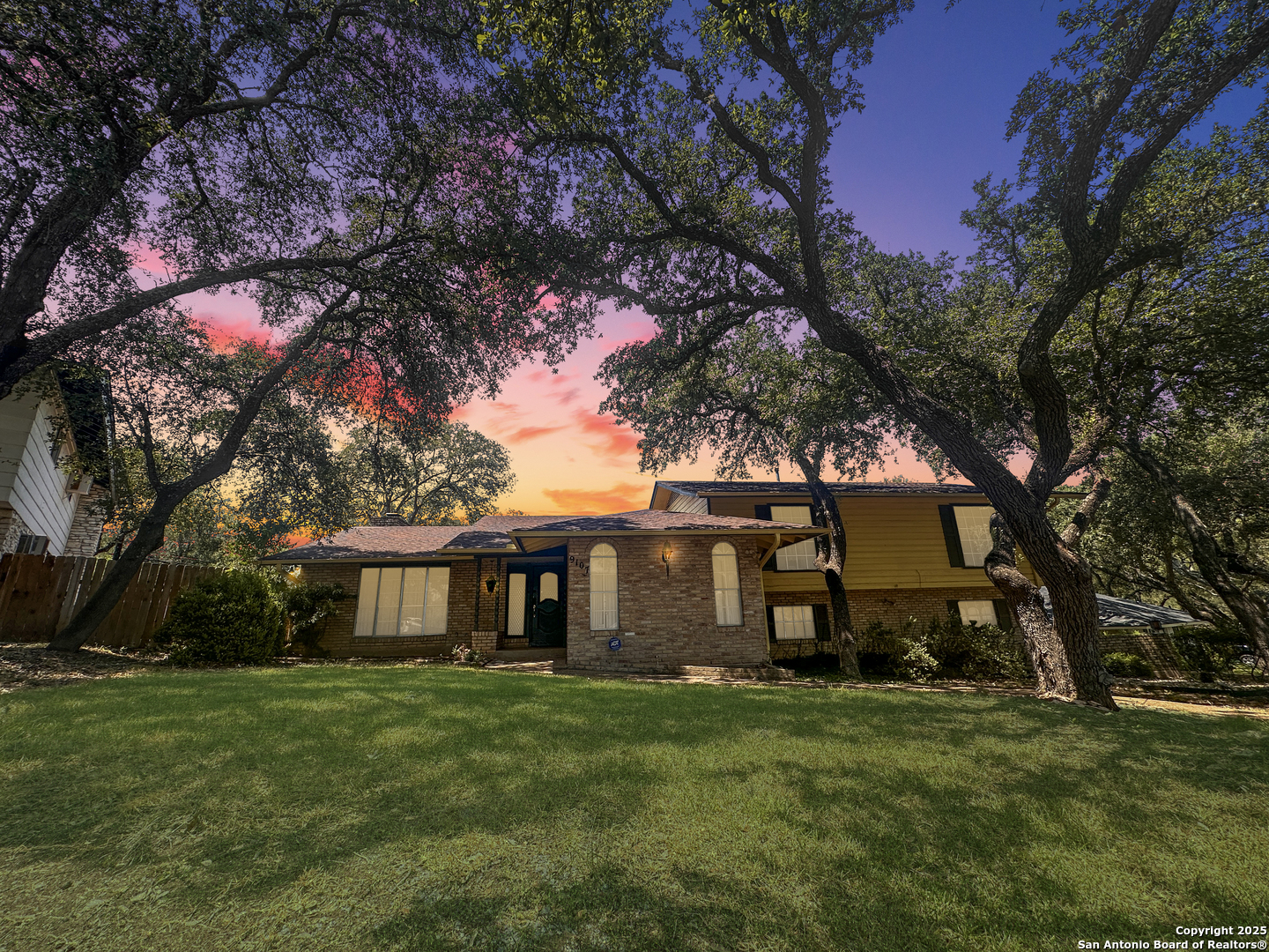 9107 Old Mill Road San Antonio, TX 78230 - Photo 1 of 14 a view of a house with backyard and garden