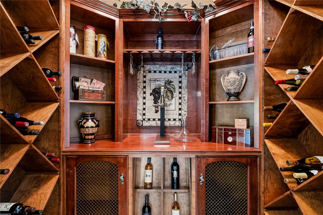 200 Graylyn Drive Anderson, SC 29621 - Photo 34 of 48 Crafted from fine wood, this wine cellar provides generous storage and a stylish tasting area.