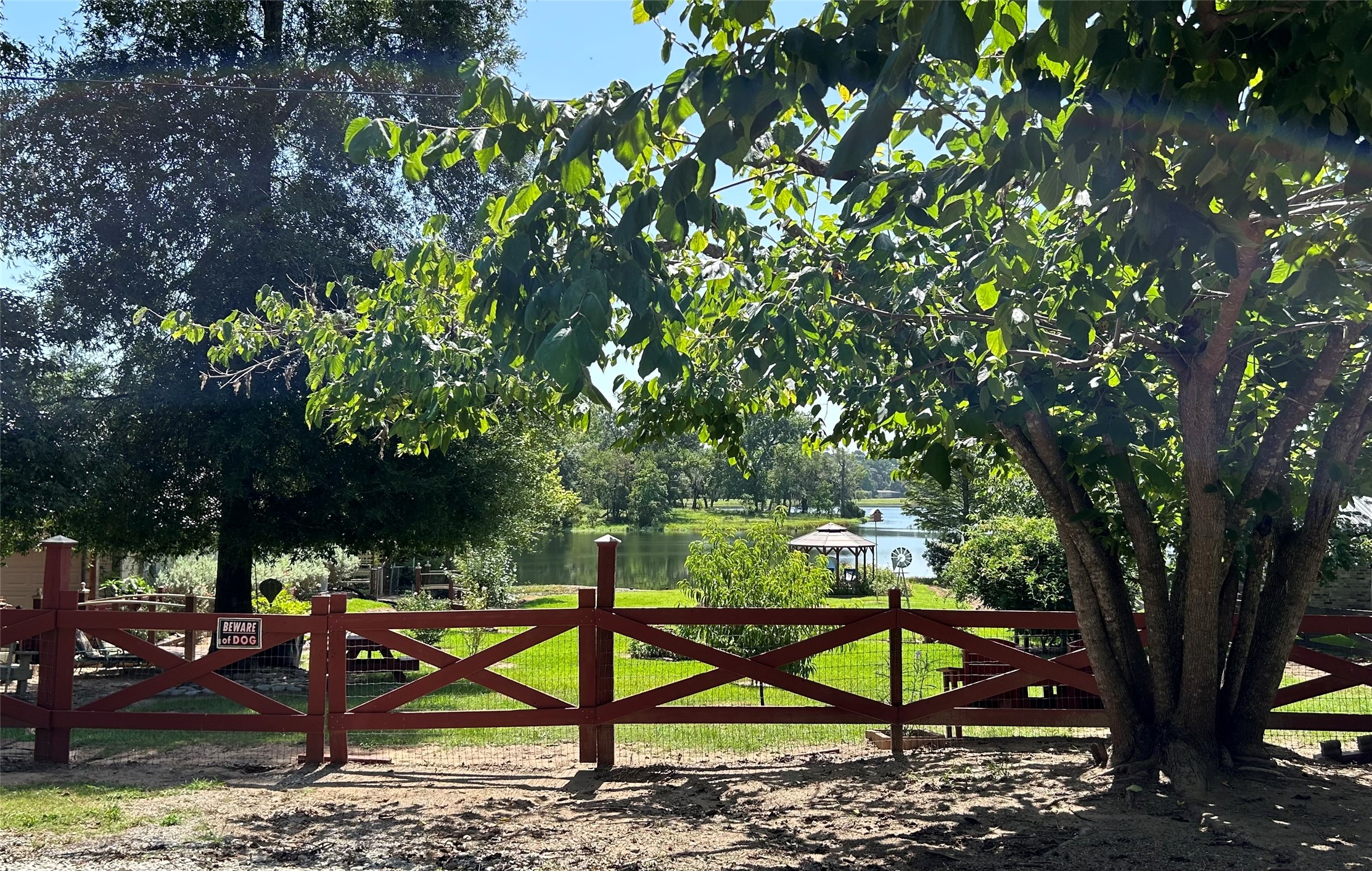 0 Royal Creek Road Conroe, TX 77303 - Photo 16 of 26 a view of a bench in a garden