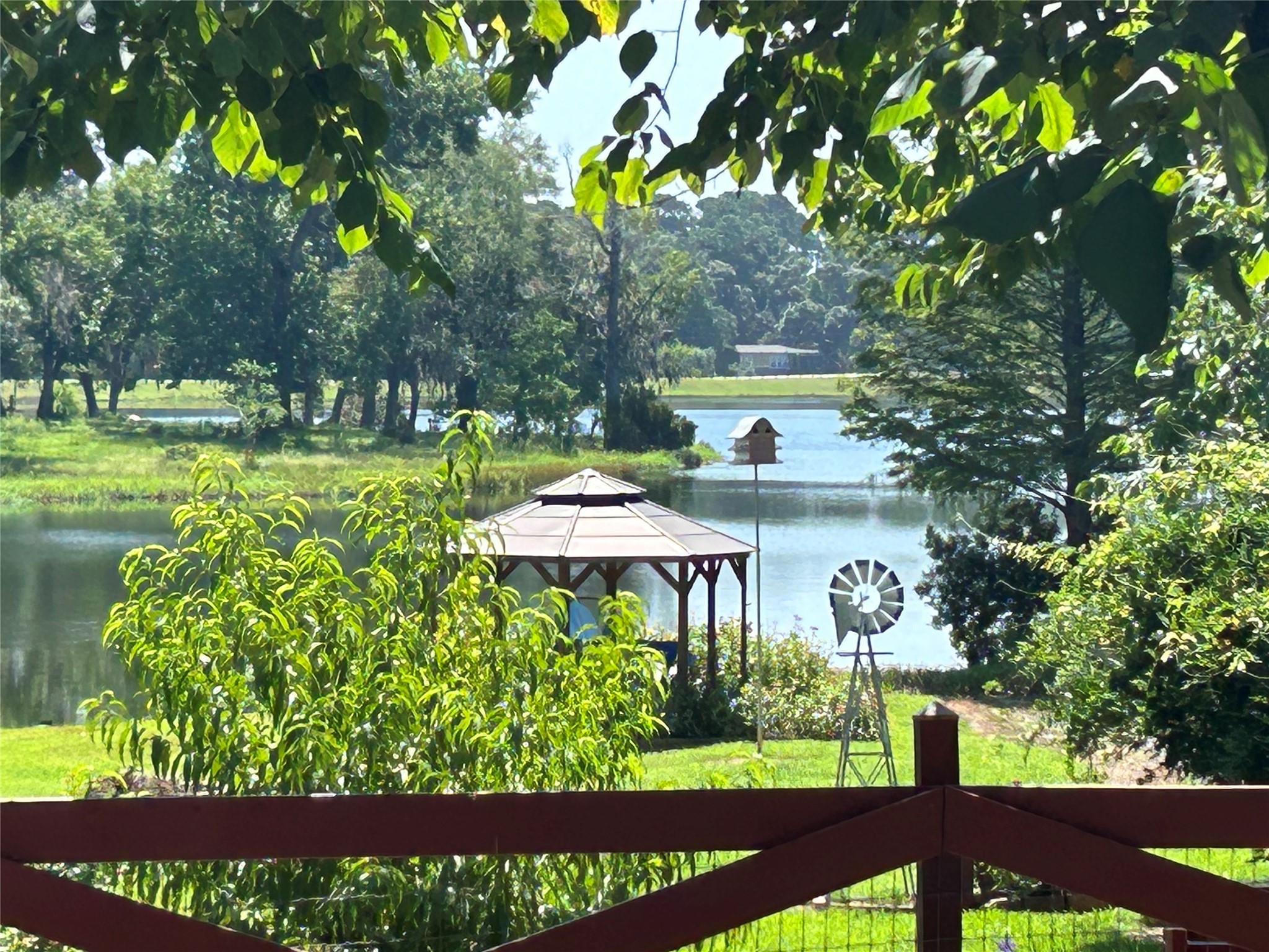0 Royal Creek Road Conroe, TX 77303 - Photo 17 of 26 a view of a house with a yard and sitting area